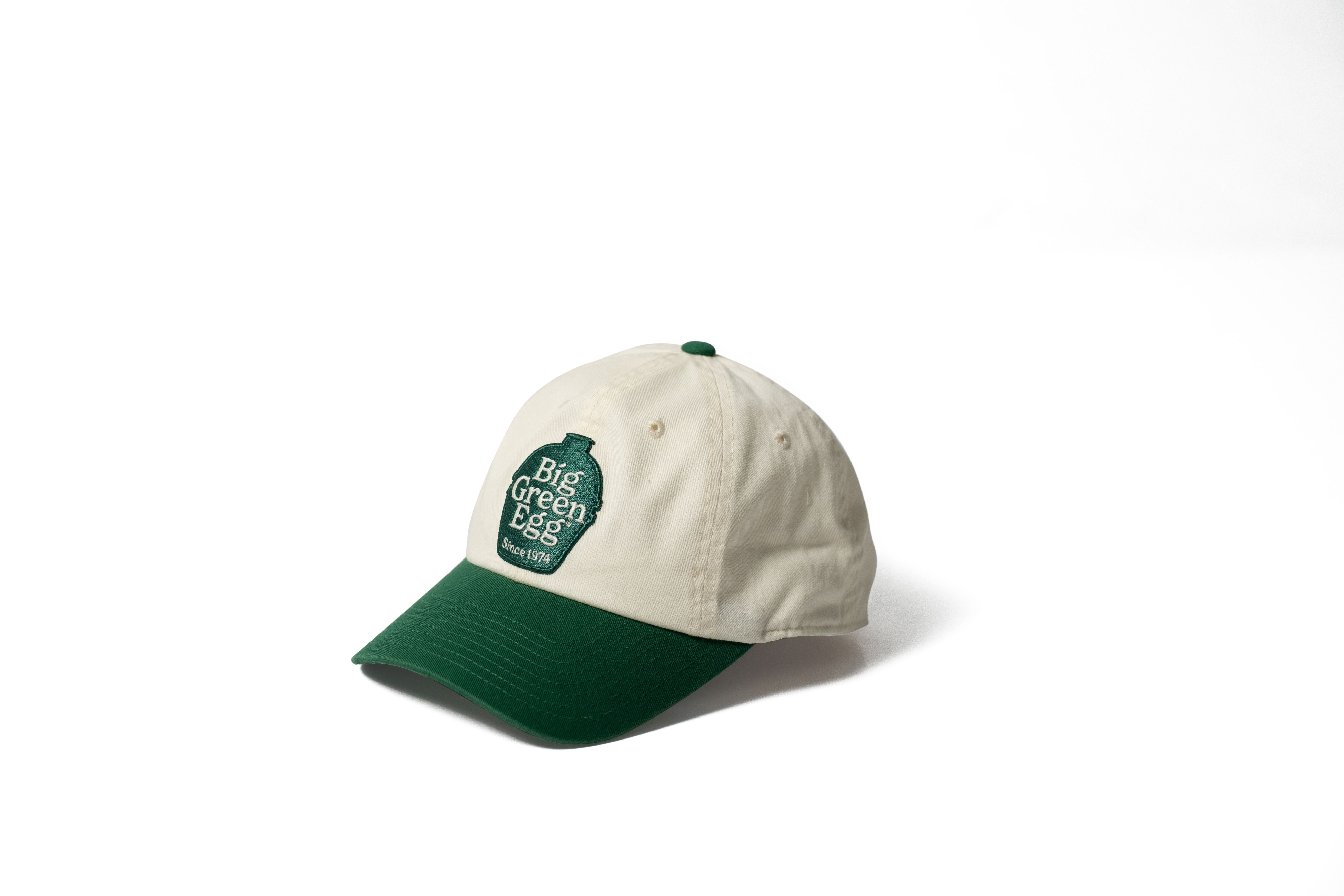 white ballcap with green bill